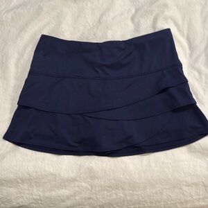 LUCKY IN LOVE TENNIS SKIRT - size Medium
